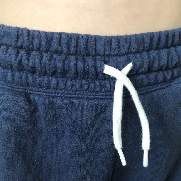 These are navy blue loose fitting sweatpants. - Picture 4 of 4